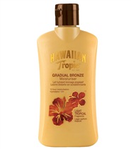 Gradual Tan Moisturiser  fr�n Hawaiian Tropic. En uppskattad klassiker som nu �r tillbaka i en ny f�rb�ttrad formula! Ger fin f�rg och lyster. Mjukg�rande och �terfuktande i 12 timmar.