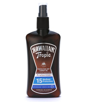 Carrot Oil Spray fr�n Hawaiian Tropic. Torra oljor tr�nger snabbt in i huden och efterl�mnar inte en oljig yta som traditionella oljor g�r.